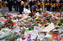 澳大利亚悉尼将举行咖啡馆劫持案一周年悼念活动 现场布置献花